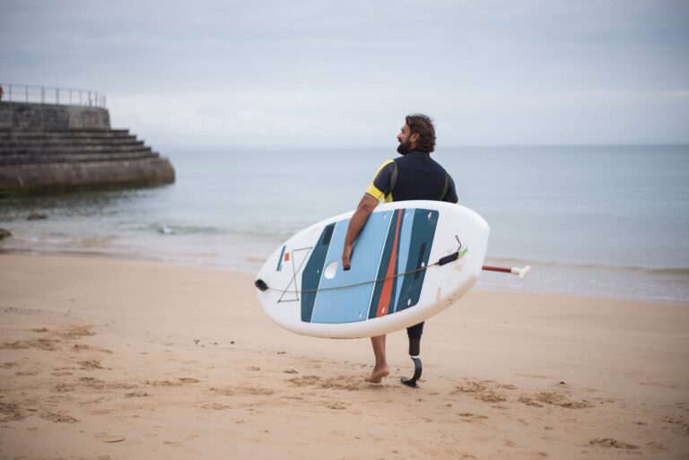 Carrying a paddle board.